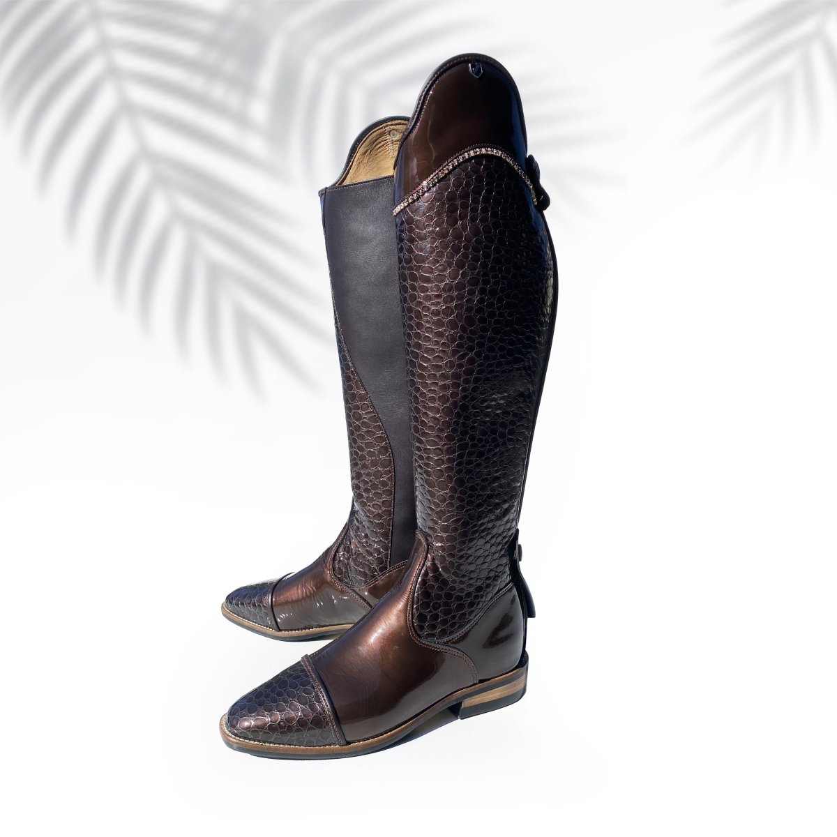 Classic tall dressage boot with rose-gold Swarovski accent rose gold zipper in shiny patent croco-leather