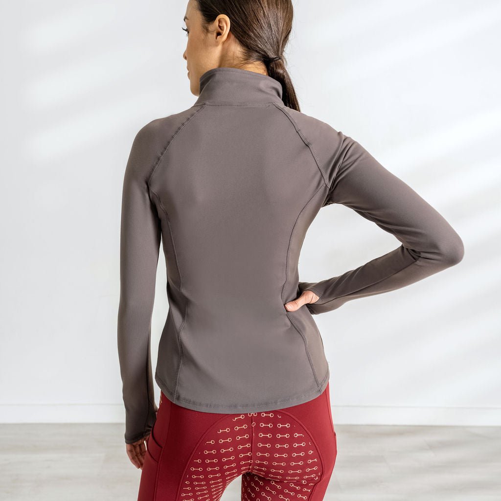 A classic slim fit style shirt for colder days, designed to be matched with your favorite breeches and boots. 