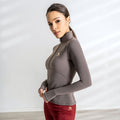 A classic slim fit style shirt for colder days, designed to be matched with your favorite breeches and boots. 